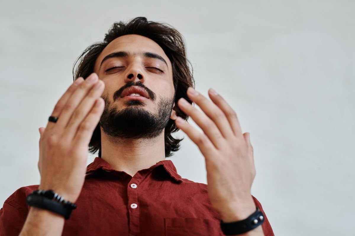 Man practicing daily mindfulness meditation to build emotional awareness